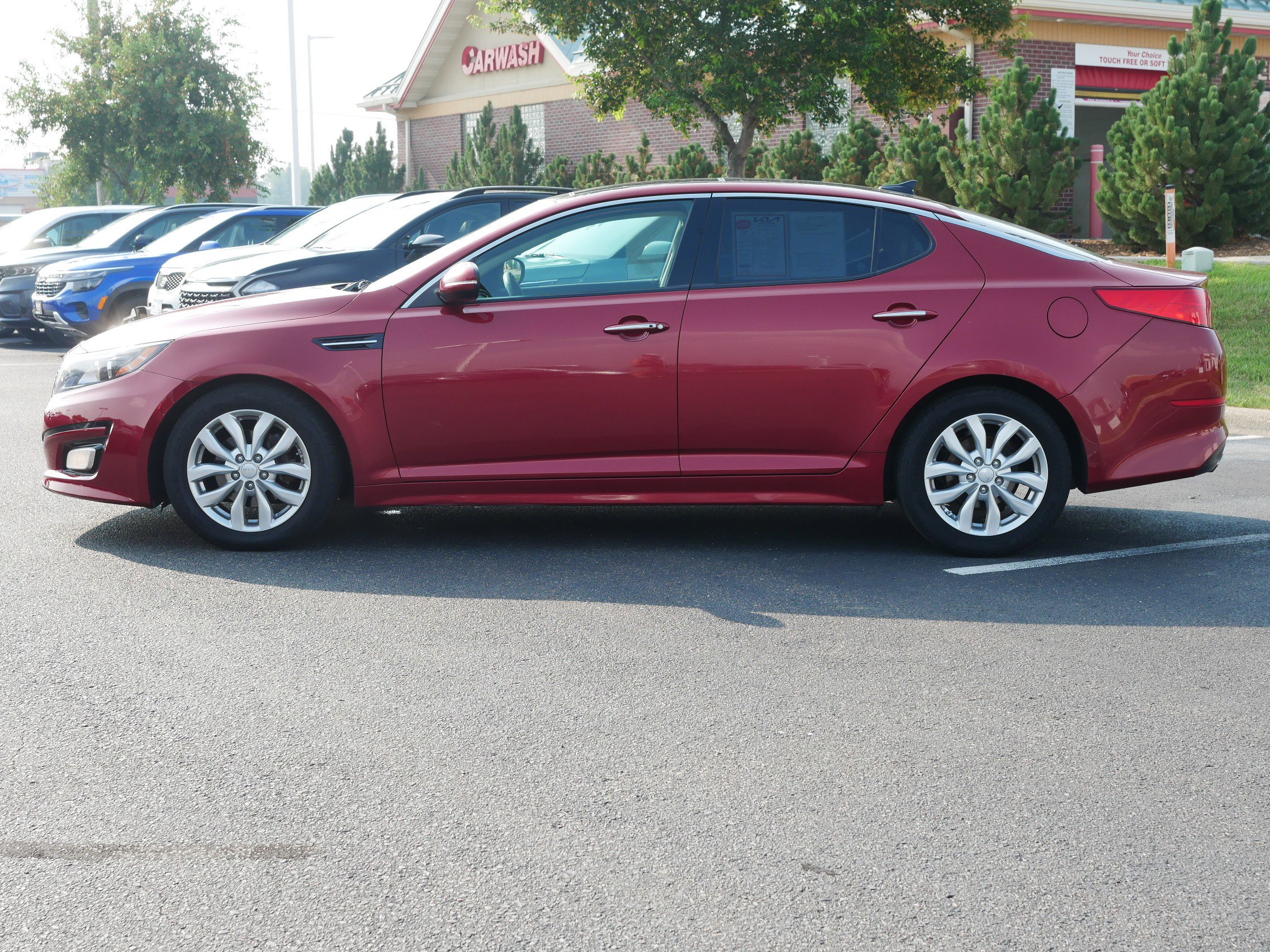 Used 2015 Kia Optima EX with VIN 5XXGN4A7XFG497004 for sale in Waite Park, Minnesota