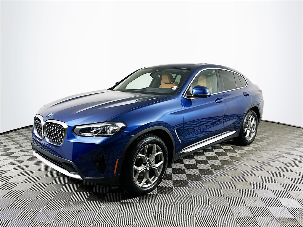 Used 2024 Phytonic Blue Metallic BMW xDrive30i image 1
