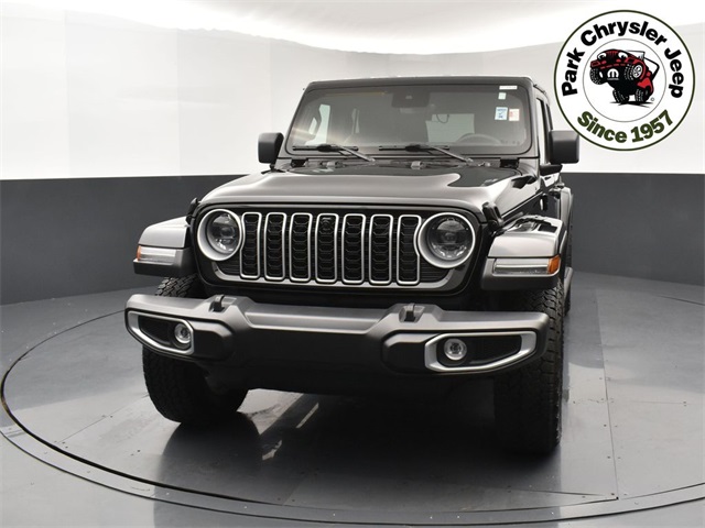 Used 2024 Jeep Wrangler 4-Door Sahara with VIN 1C4PJXEG6RW337728 for sale in Burnsville, Minnesota