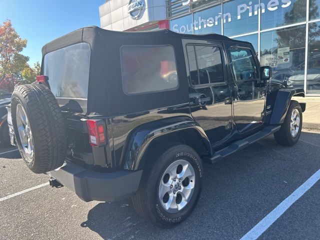 Used 2015 Jeep Wrangler Unlimited Sahara with VIN 1C4HJWEG1FL679891 for sale in Southern Pines, NC