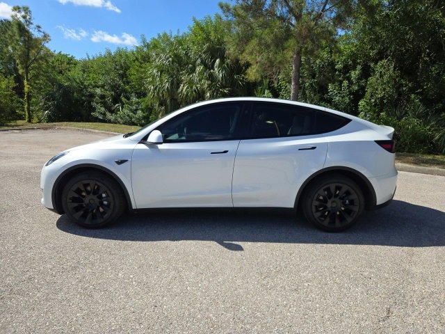 Used 2023 Tesla Model Y Long Range with VIN 7SAYGDEE8PF937543 for sale in Sarasota, FL
