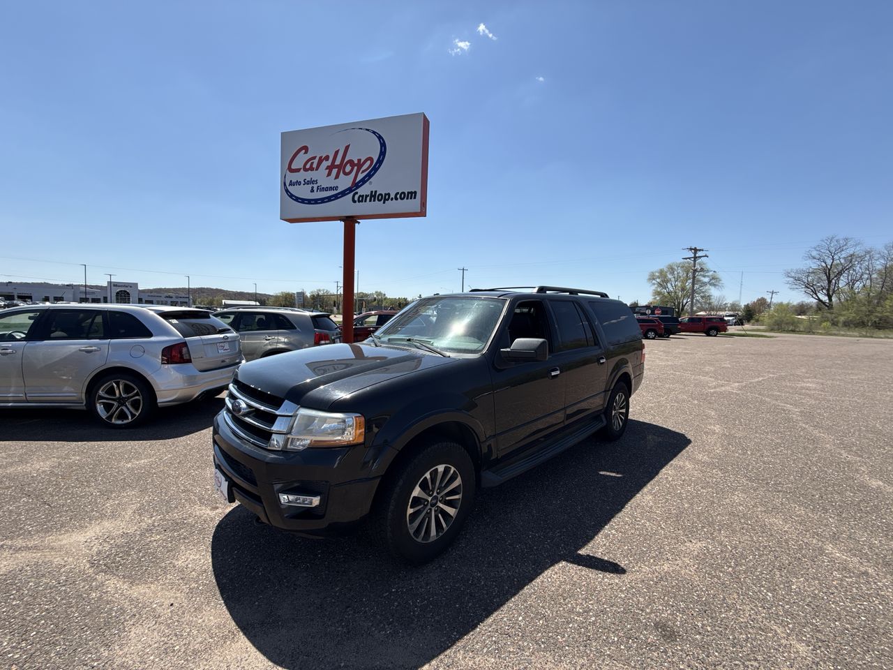 Used 2015 Black Ford XLT SPORT UTILITY 4D image 1