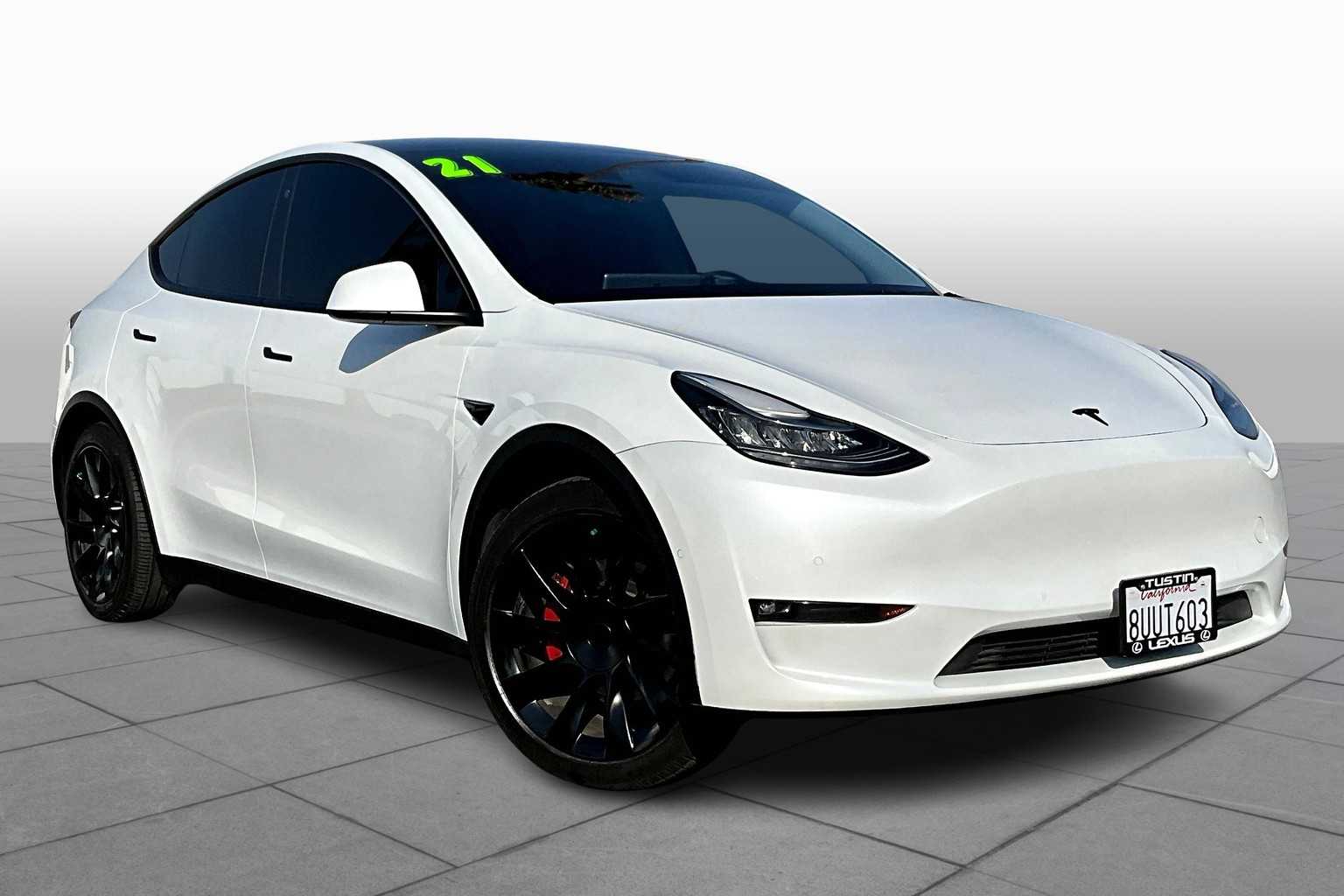 Used 2021 Tesla Model Y Standard Range with VIN 5YJYGDED3MF103745 for sale in Tustin, CA