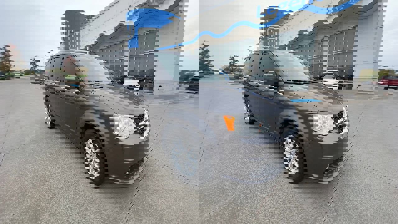 Used 2020 Dodge Grand Caravan SXT with VIN 2C4RDGCG3LR179402 for sale in Kansas City