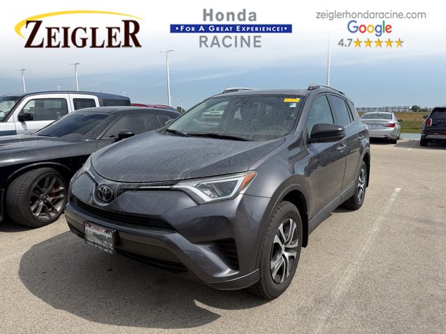 Used 2015 Toyota RAV4 LE with VIN JTMBFREV8FD141013 for sale in Sturtevant, WI