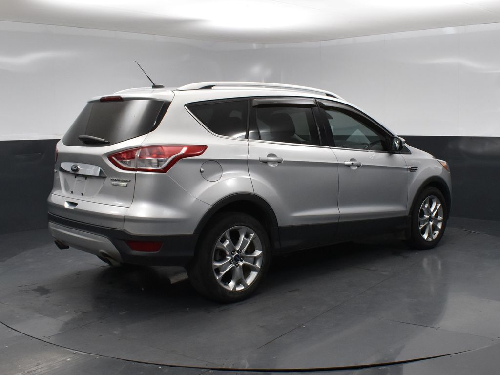 Used 2014 Ford Escape Titanium with VIN 1FMCU0JX4EUE00426 for sale in McPherson, KS