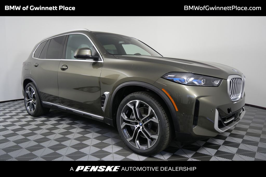 New 2025 Manhattan Green Metallic BMW xDrive50e image 1