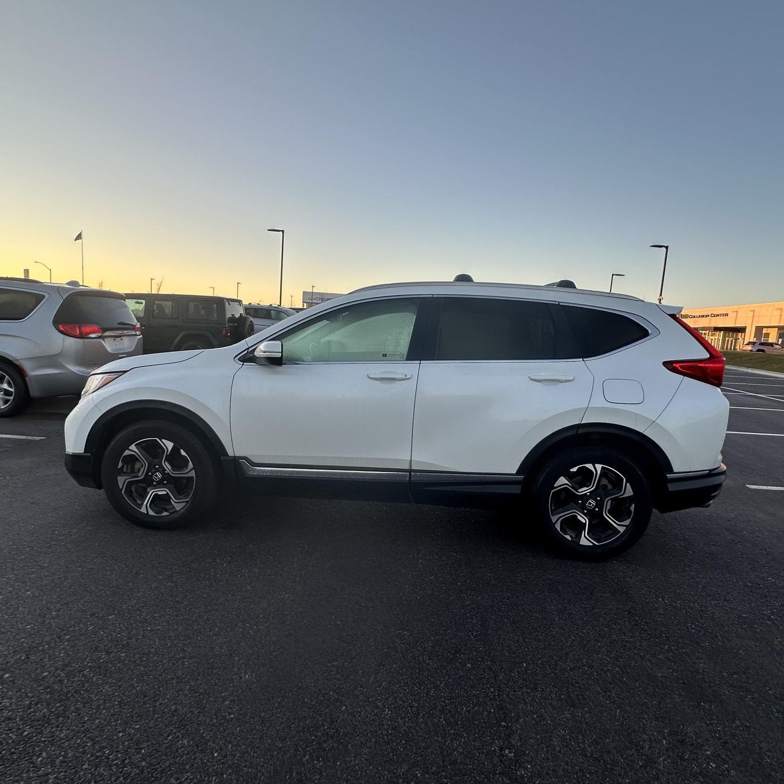 Used 2017 Honda CR-V Touring with VIN 2HKRW2H97HH630374 for sale in Kansas City