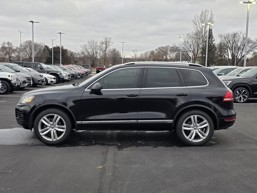 Used 2013 Volkswagen Touareg Sport with VIN WVGEP9BP2DD012256 for sale in St. Cloud, Minnesota