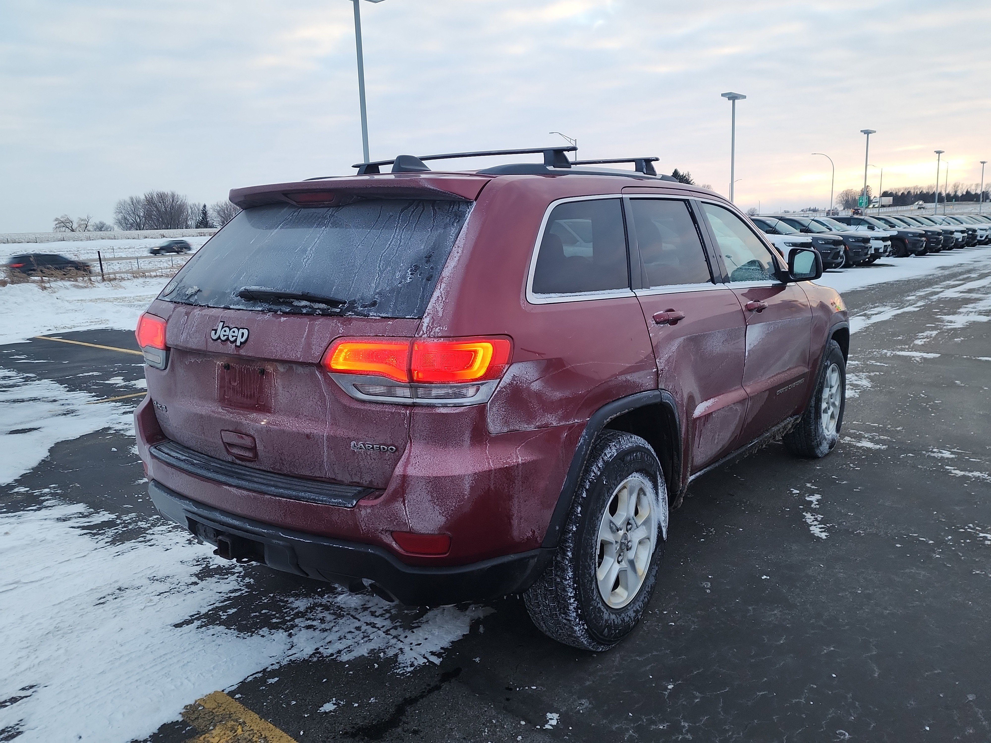 Used 2014 Jeep Grand Cherokee Laredo with VIN 1C4RJFAG3EC231001 for sale in Burnsville, Minnesota