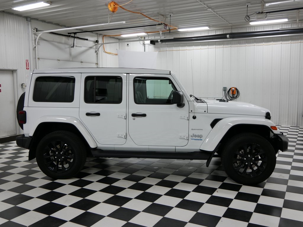 Used 2021 Jeep Wrangler Unlimited Sahara 4XE with VIN 1C4JJXP62MW776735 for sale in Rochester, Minnesota
