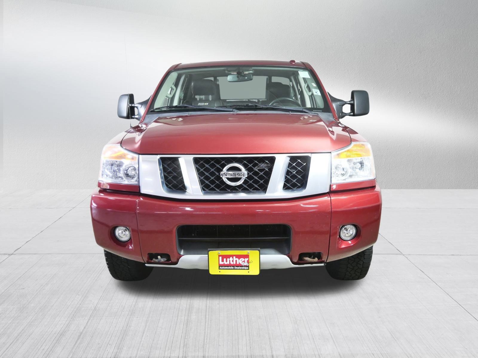 Used 2014 Nissan Titan PRO-4X with VIN 1N6BA0EC2EN518577 for sale in Brooklyn Center, Minnesota