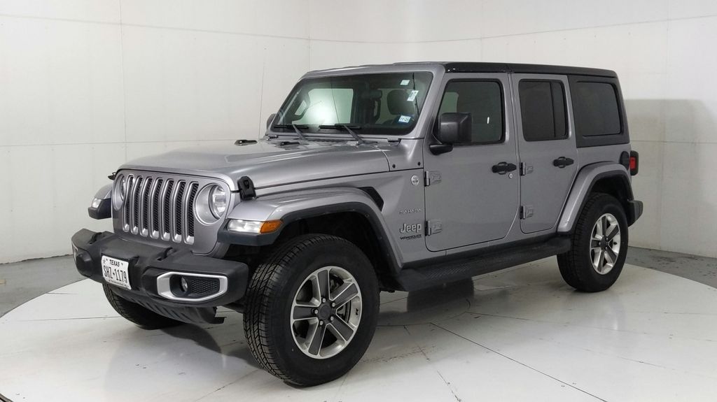 Used 2020 Silver Jeep Unlimited Sahara image 1