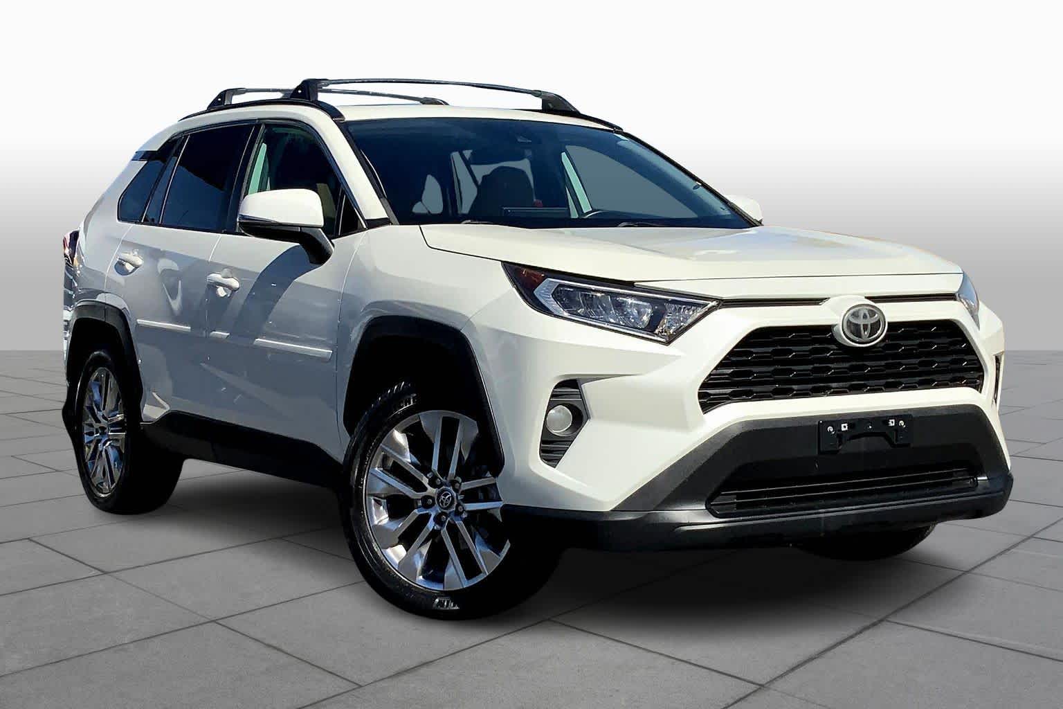 Used 2021 Toyota RAV4 XLE Premium with VIN 2T3C1RFV0MW120156 for sale in Northfield, Minnesota