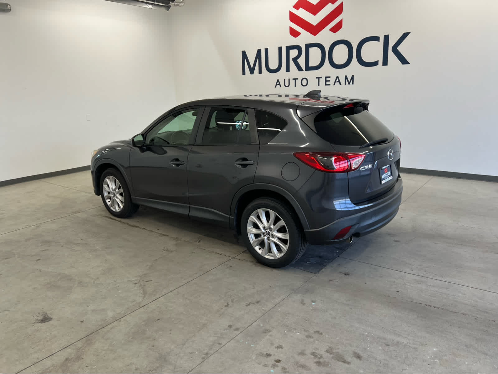 Used 2015 Mazda CX-5 Grand Touring with VIN JM3KE2DY0F0524772 for sale in Logan, UT