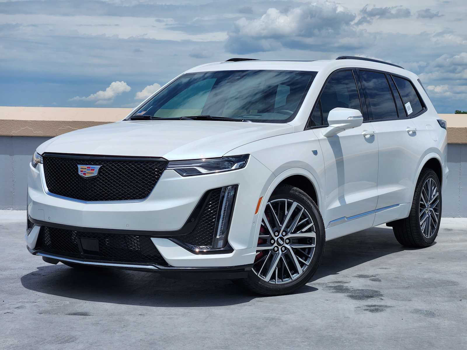 New 2025 Crystal White Tricoat Cadillac Sport image 1