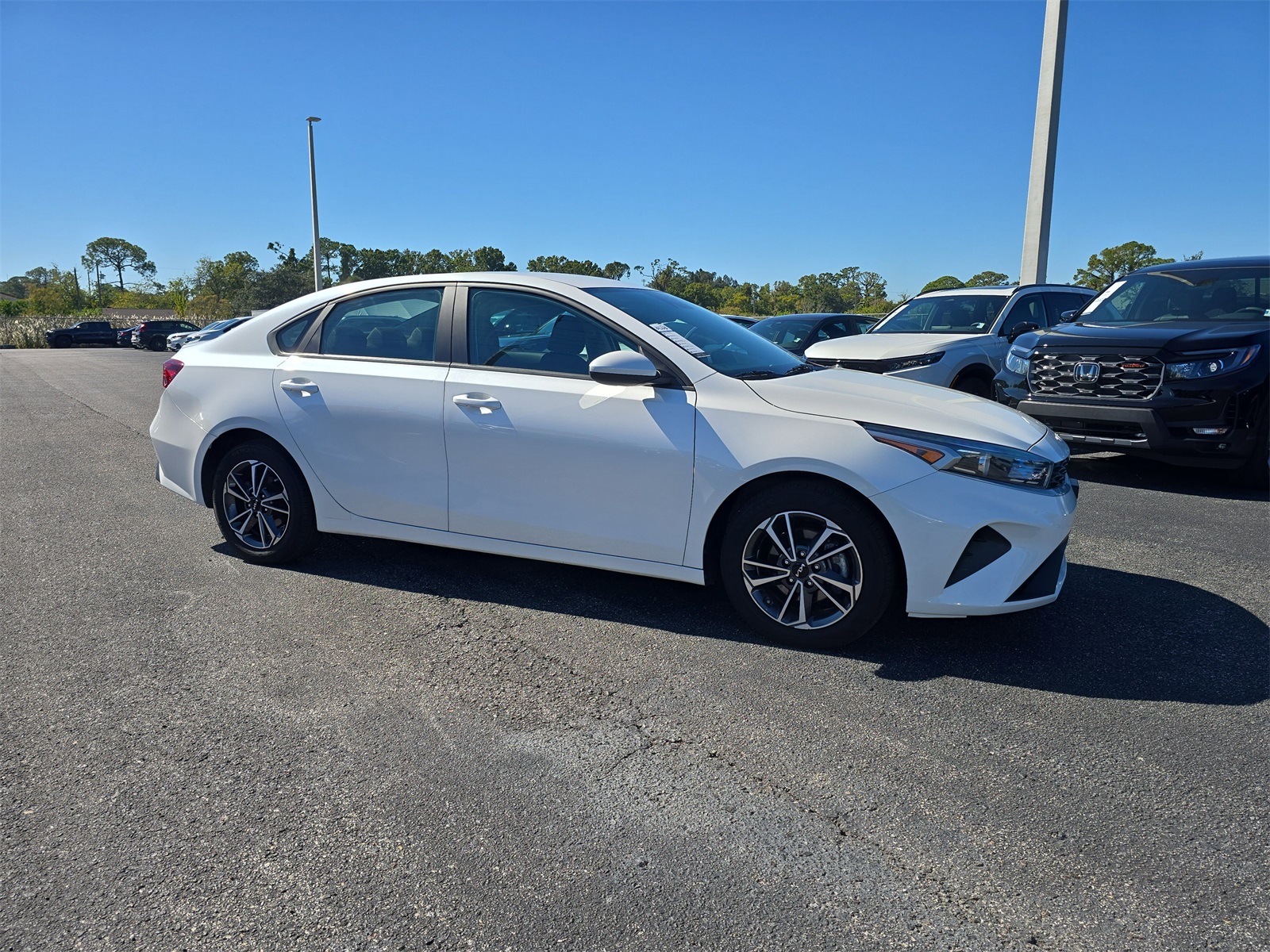 Used 2023 Kia Forte LXS with VIN 3KPF24AD9PE571730 for sale in Port Richey, FL