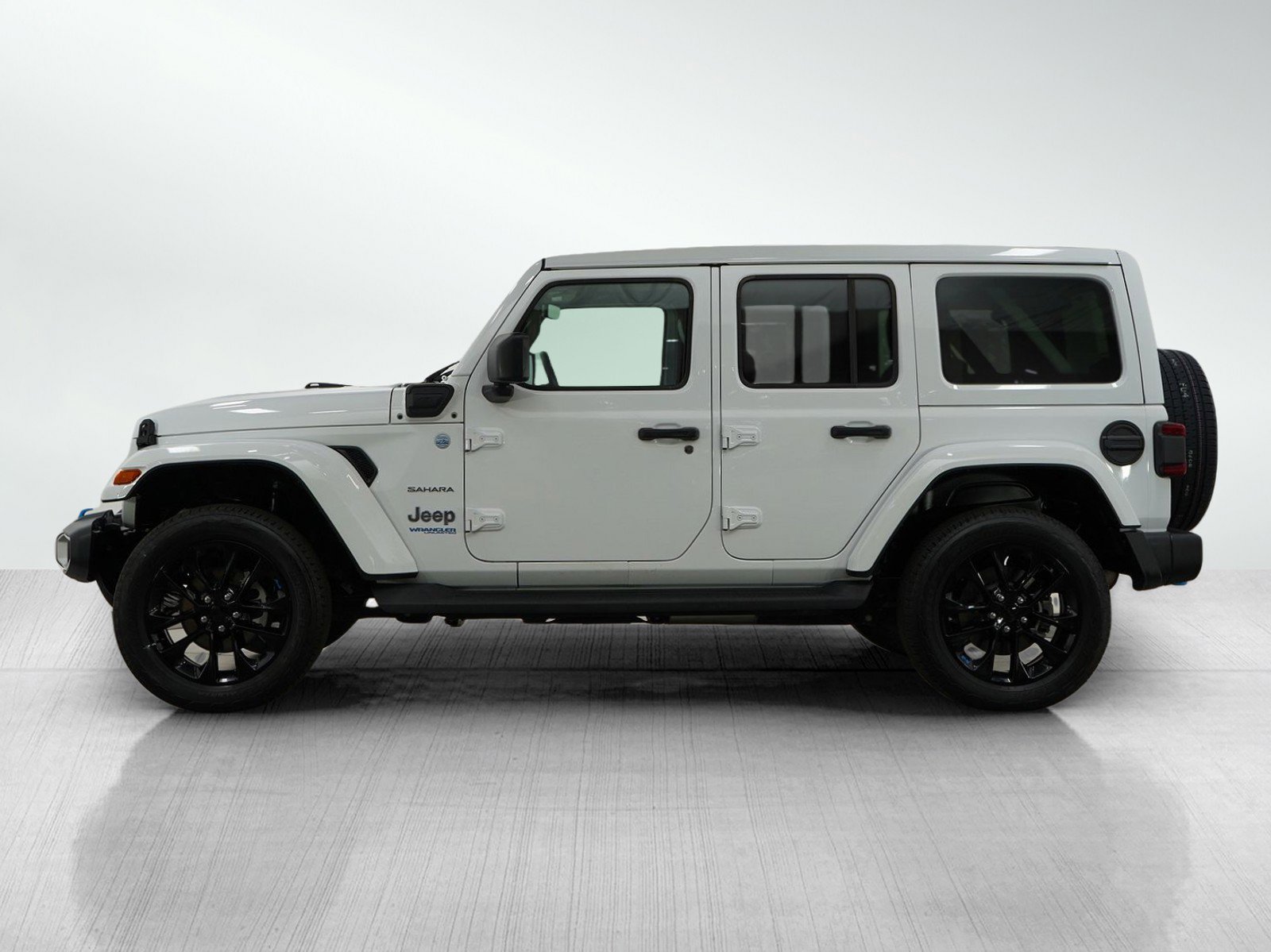Used 2022 Jeep Wrangler Unlimited Sahara 4XE with VIN 1C4JJXP63NW233301 for sale in Burnsville, Minnesota