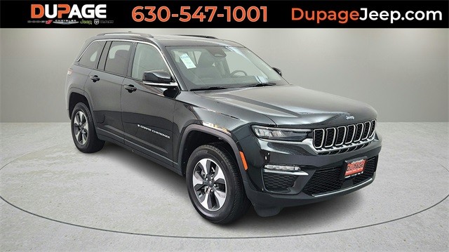 PRE-OWNED 2023 JEEP GRAND CHEROKEE 4XE WITH NAVIGATION & 4WD