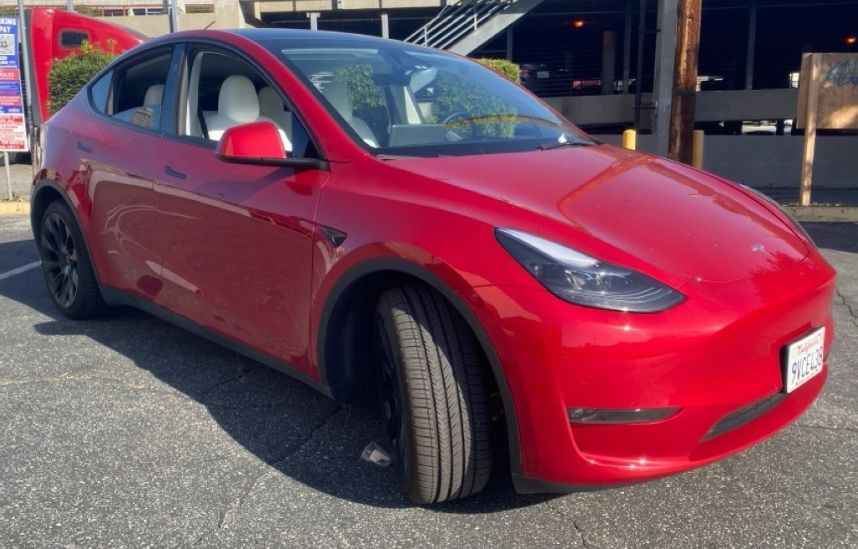 Used 2023 Tesla Model Y Long Range with VIN 7SAYGDEE9PF883010 for sale in Kansas City