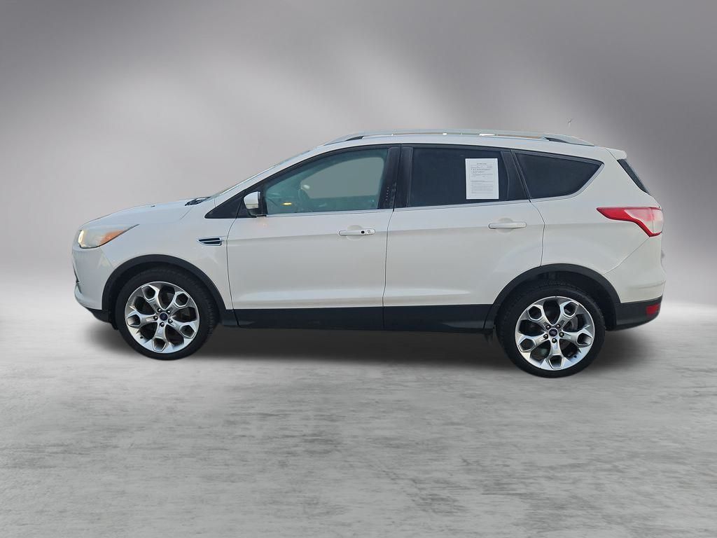 Used 2015 Ford Escape Titanium with VIN 1FMCU9J97FUB92890 for sale in Traverse City, MI