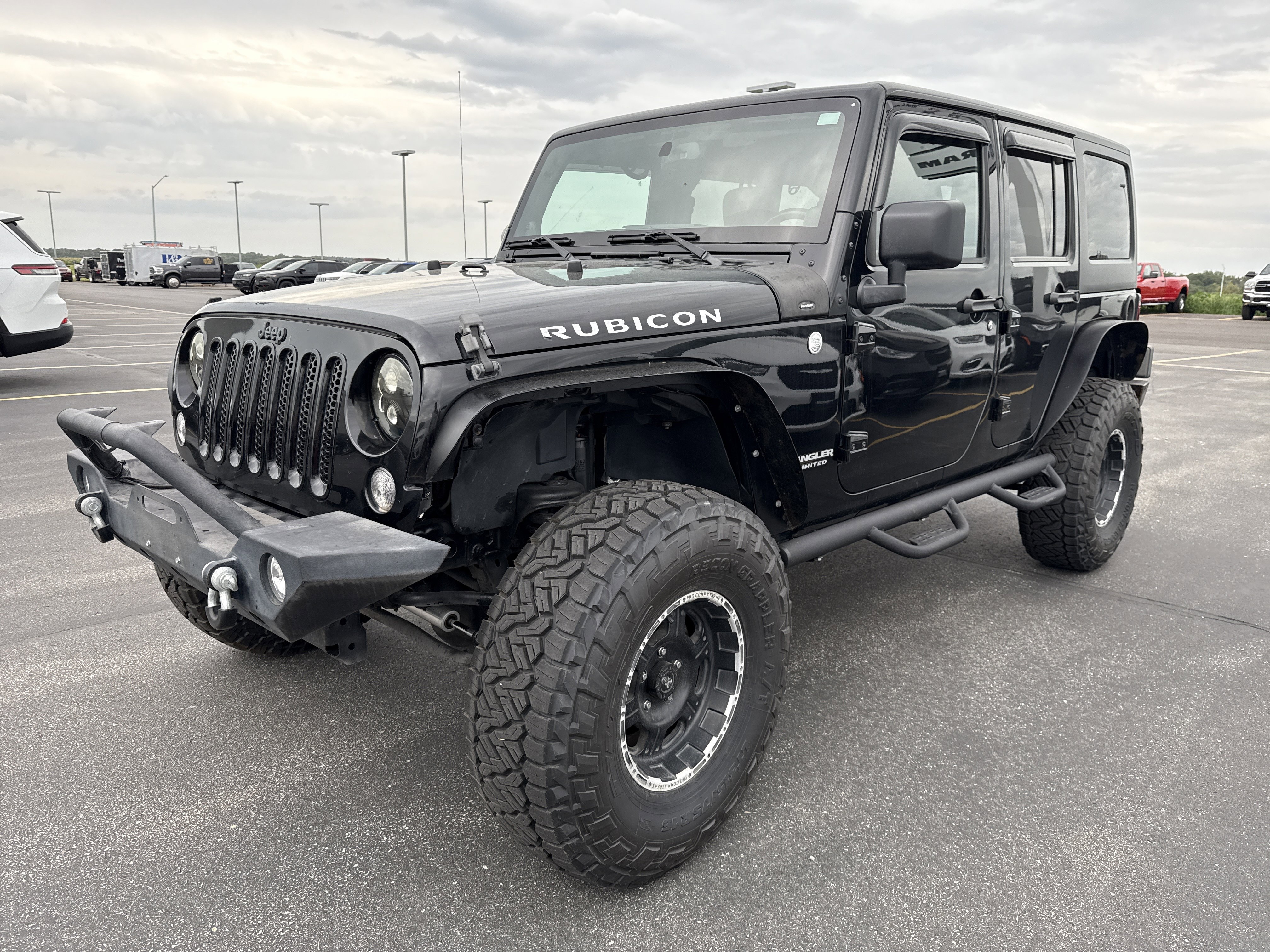 Used 2014 Jeep Wrangler Unlimited Rubicon with VIN 1C4BJWFG0EL191468 for sale in Saint Charles, Minnesota