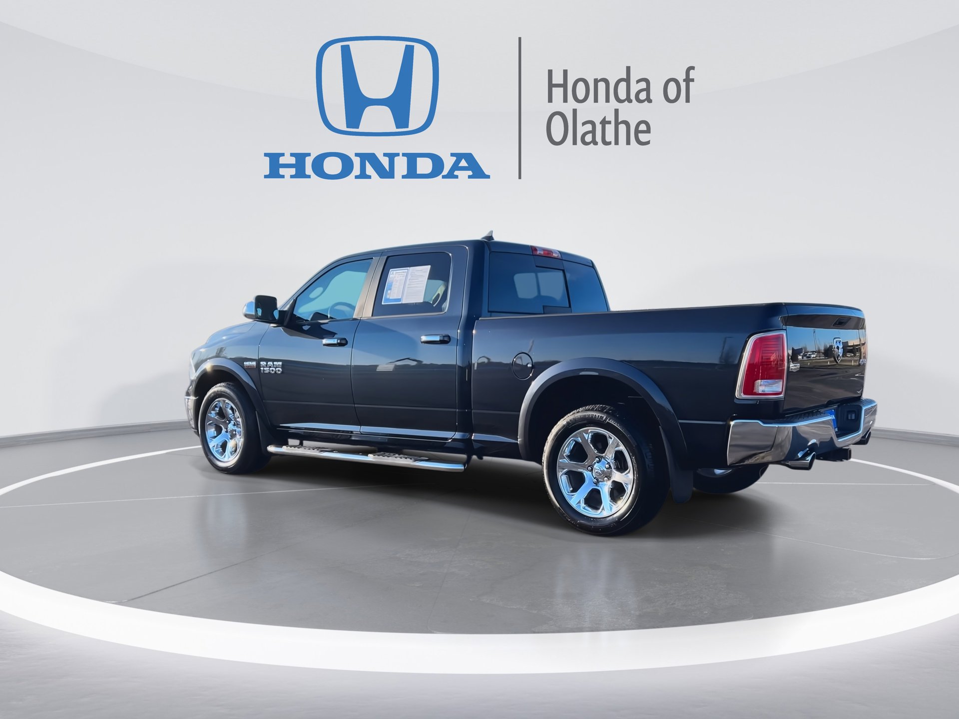 Used 2014 RAM Ram 1500 Pickup Laramie with VIN 1C6RR7VT7ES309119 for sale in Kansas City