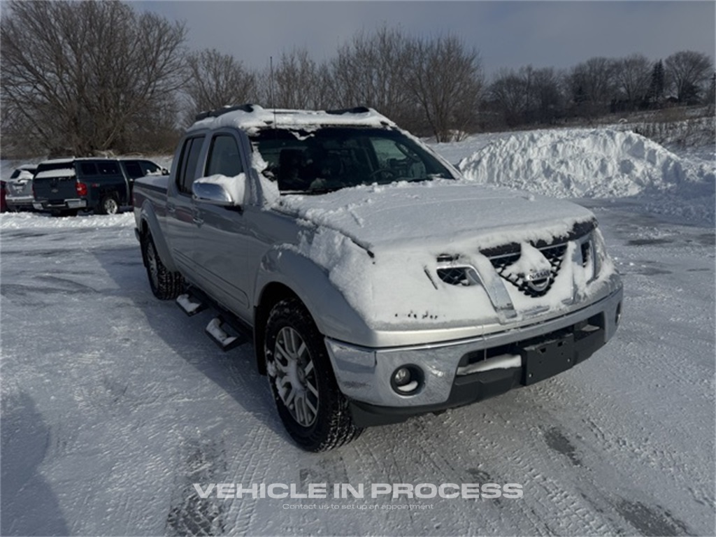 2009 Nissan Frontier LE's photo