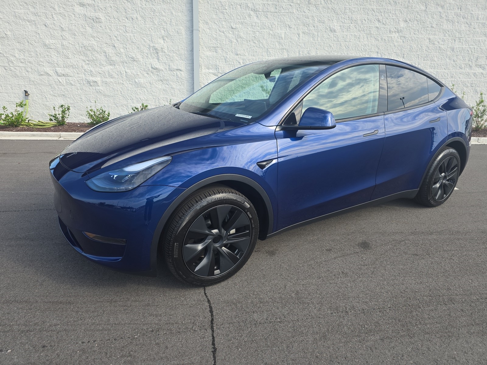 Used 2024 Tesla Model Y Long Range with VIN 7SAYGDED4RA304819 for sale in Myrtle Beach, SC