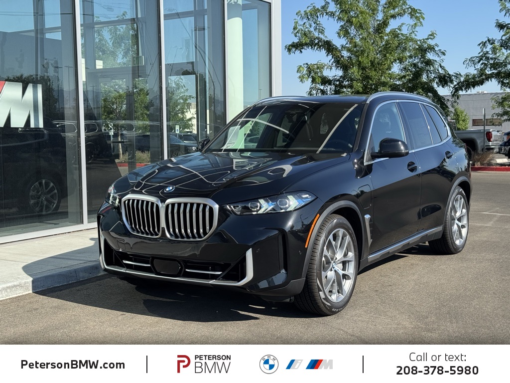 New 2026 Black Sapphire Metallic BMW xDrive50e image 1