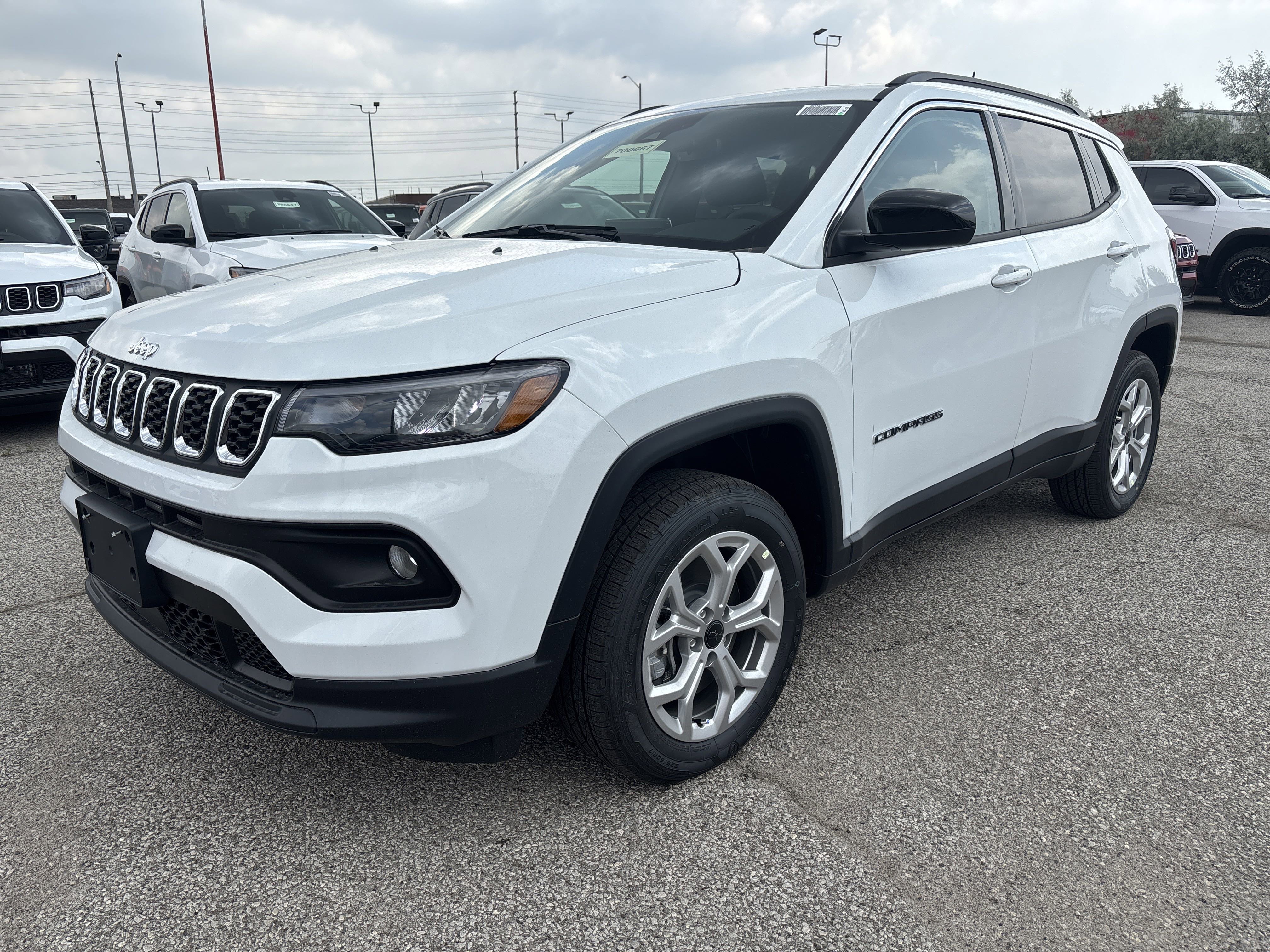New 2025 Bright White Jeep North image 1