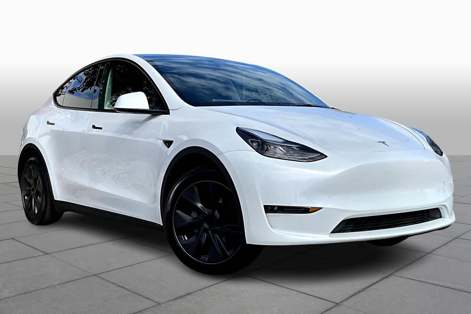 Used 2025 Tesla Model Y Long Range with VIN 7SAYGDED4SF250740 for sale in Owings Mills, MD