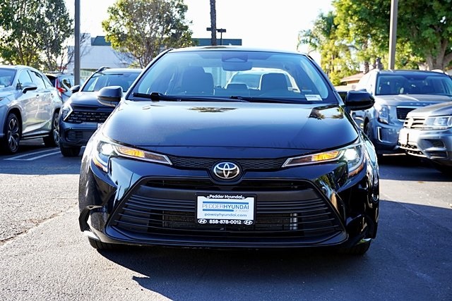 Used 2024 Black Toyota LE image 4