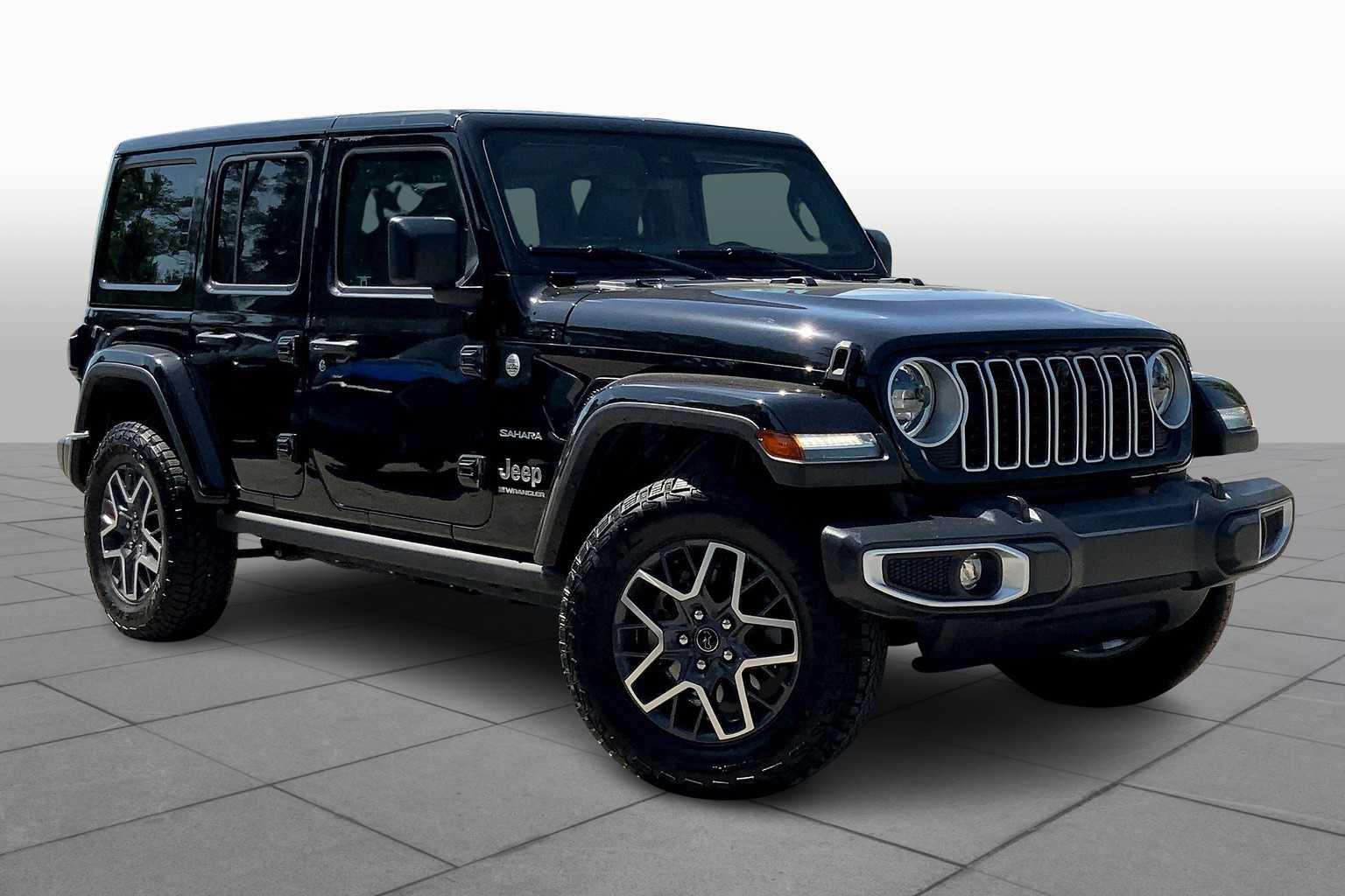 Used 2024 Jeep Wrangler 4-Door Sahara with VIN 1C4PJXEN5RW110853 for sale in Kansas City