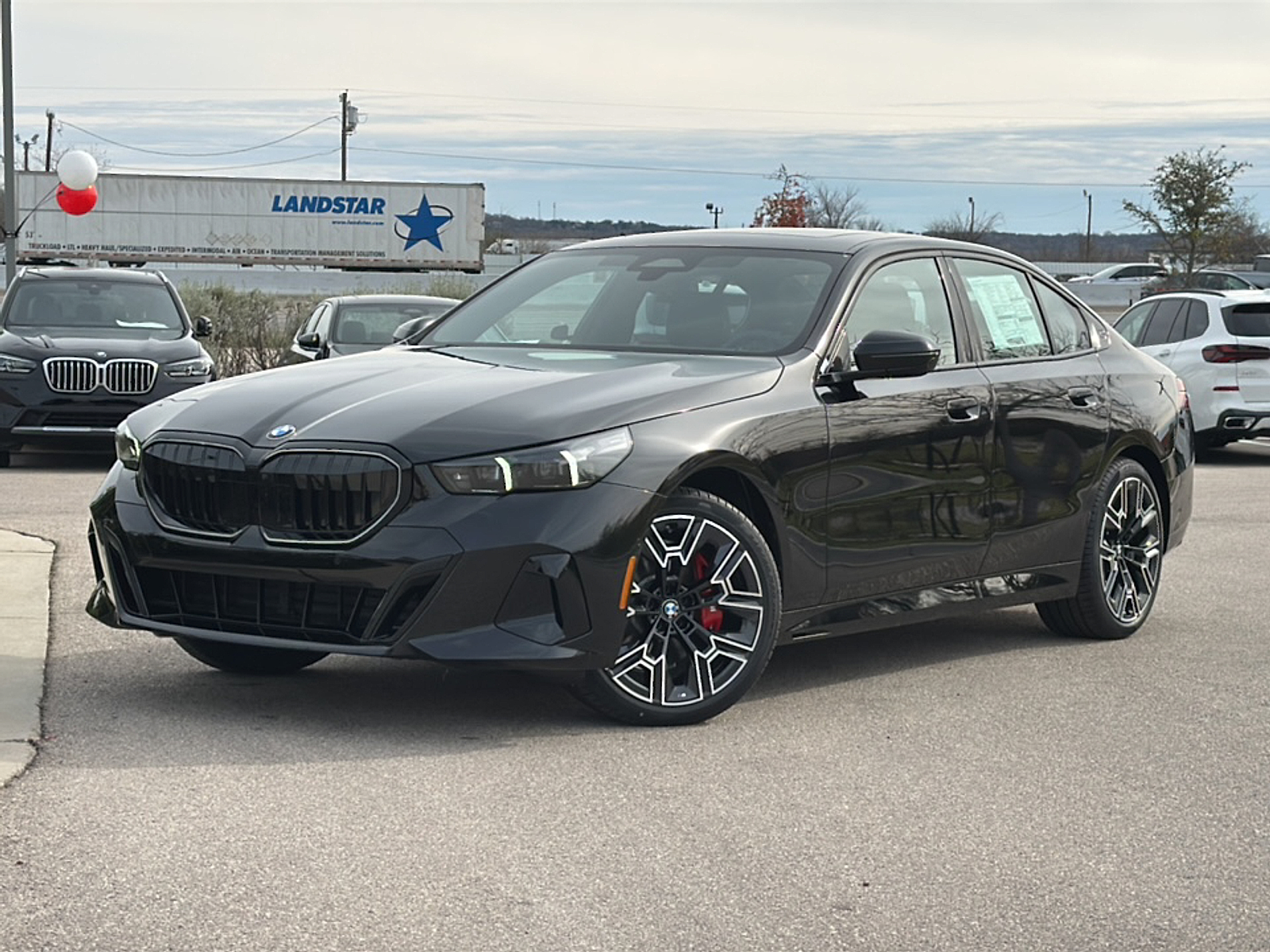 New 2025 Black Sapphire Metallic BMW i image 2