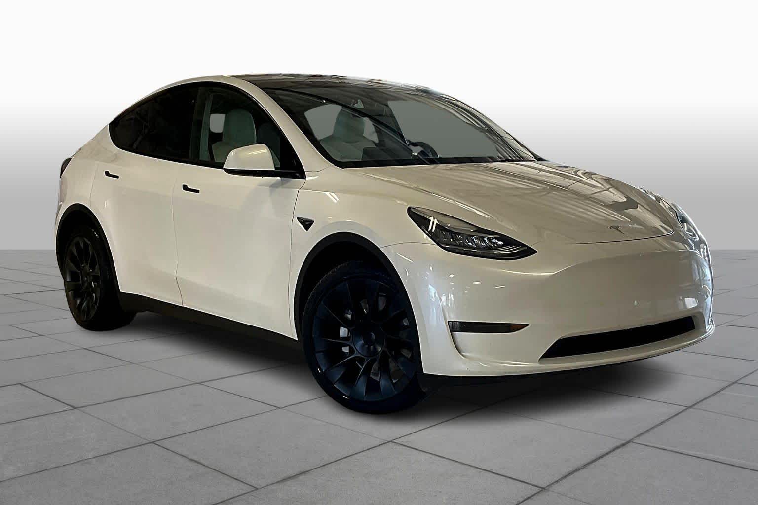 Used 2023 Tesla Model Y Long Range with VIN 7SAYGDEE0PA100394 for sale in Arlington, TX
