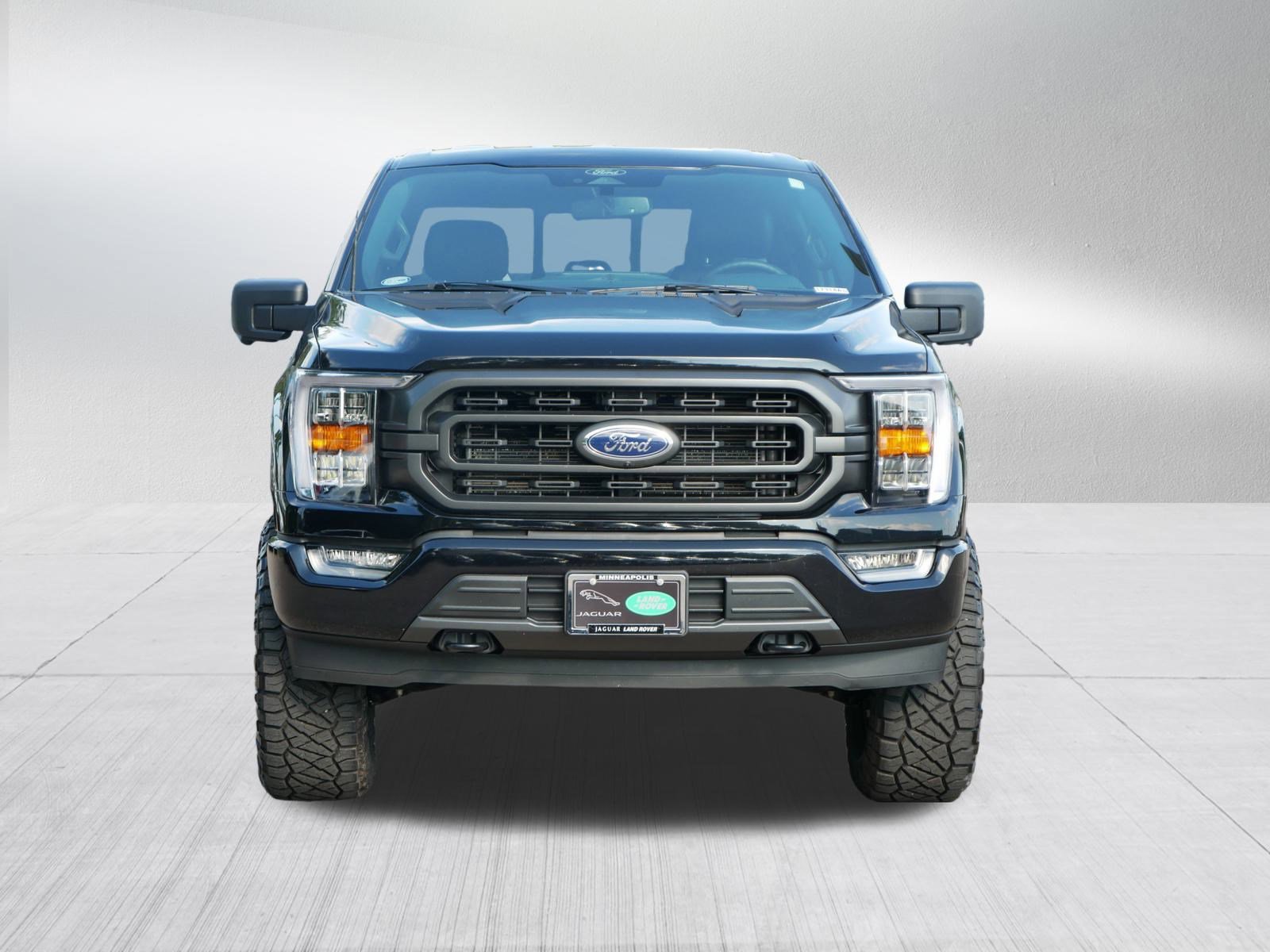 Used 2022 Ford F-150 XLT with VIN 1FTFW1E53NKD22677 for sale in Minneapolis, Minnesota