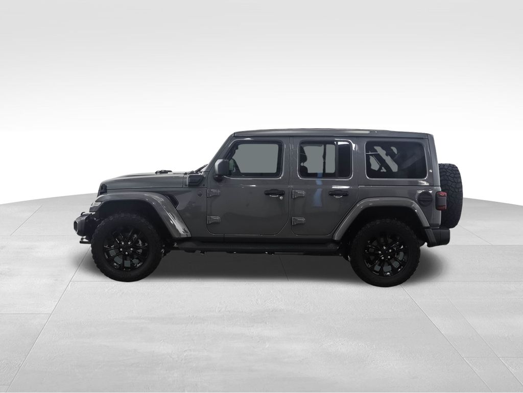 Used 2021 Jeep Wrangler Unlimited Sahara 4XE with VIN 1C4JJXP65MW861181 for sale in Minneapolis, Minnesota
