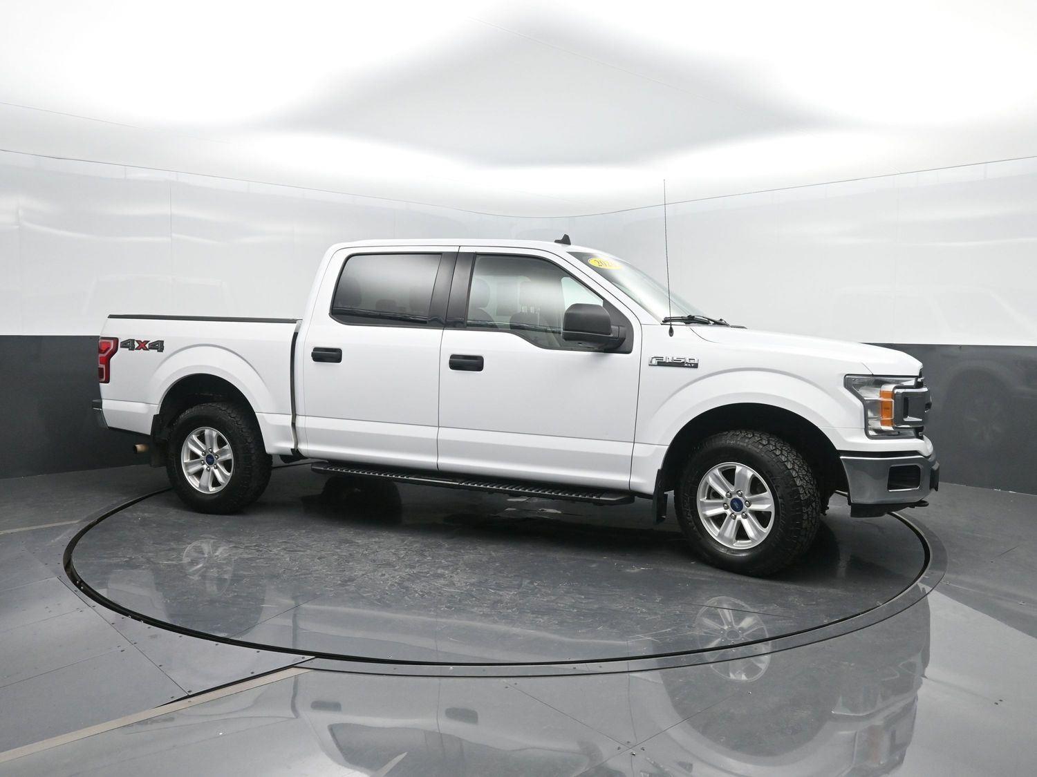 Used 2020 Ford F-150 XLT with VIN 1FTEW1EBXLKD69204 for sale in Charles City, IA