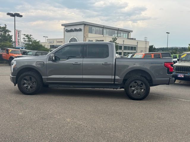 Used 2022 Ford F-150 Lightning Lariat with VIN 1FTVW1EL7NWG08213 for sale in Castle Rock, CO