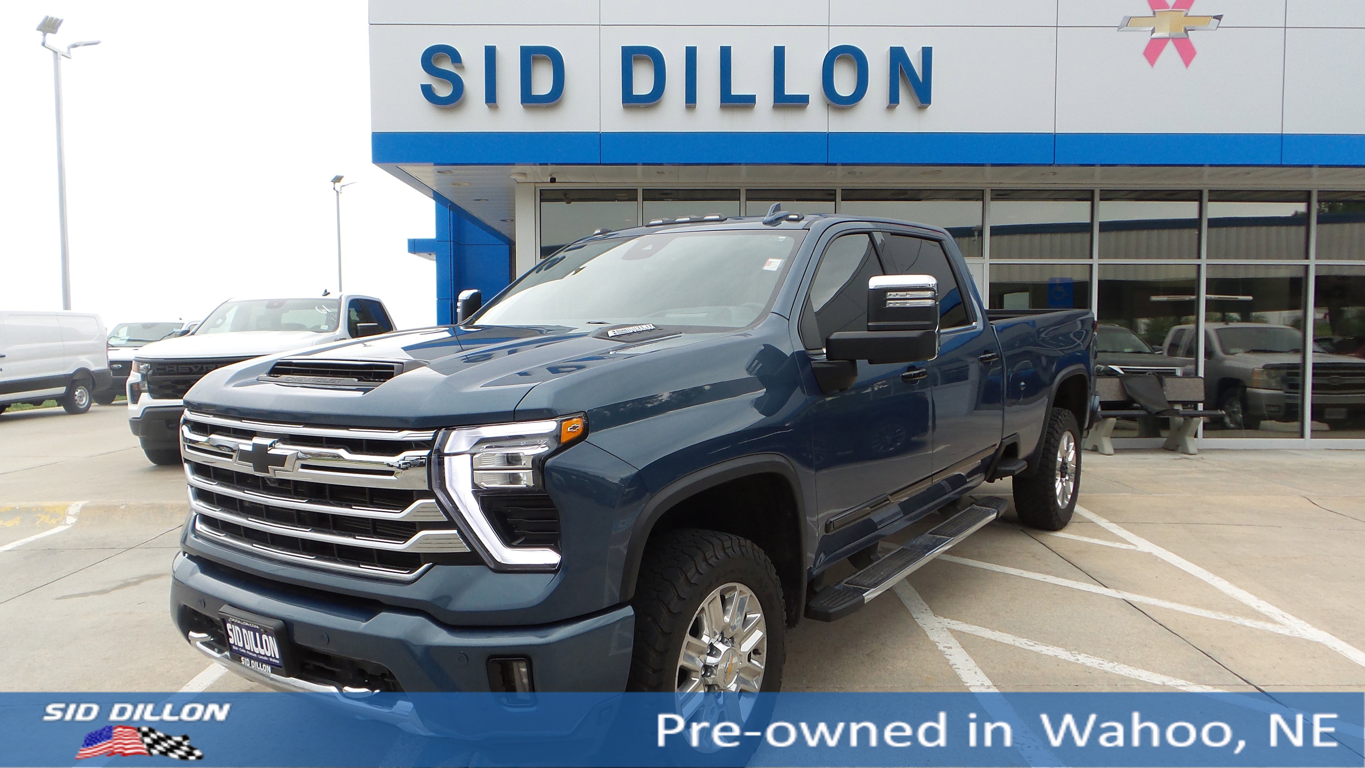 Used 2024 Lakeshore Blue Metallic Chevrolet High Country image 1