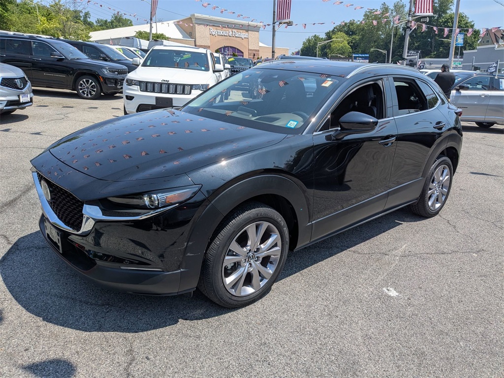 Used 2021 Black Mazda Premium image 1