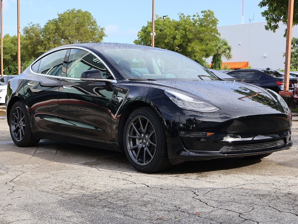 Used 2019 Tesla Model 3 Base with VIN 5YJ3E1EA3KF422483 for sale in Miami, FL