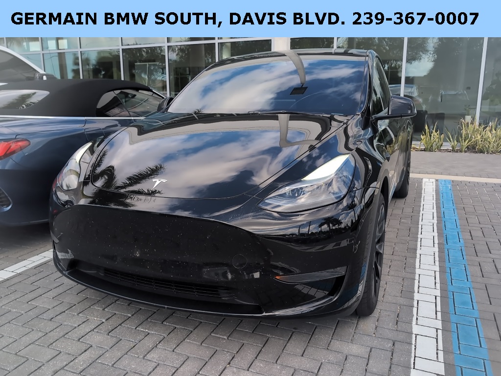 Used 2025 Tesla Model Y Long Range with VIN 7SAYGDED4SA336904 for sale in Naples, FL