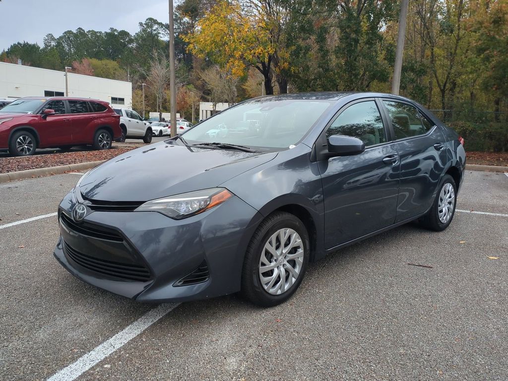 Used 2017 Toyota Corolla LE with VIN 5YFBURHE9HP696117 for sale in Gainesville, FL