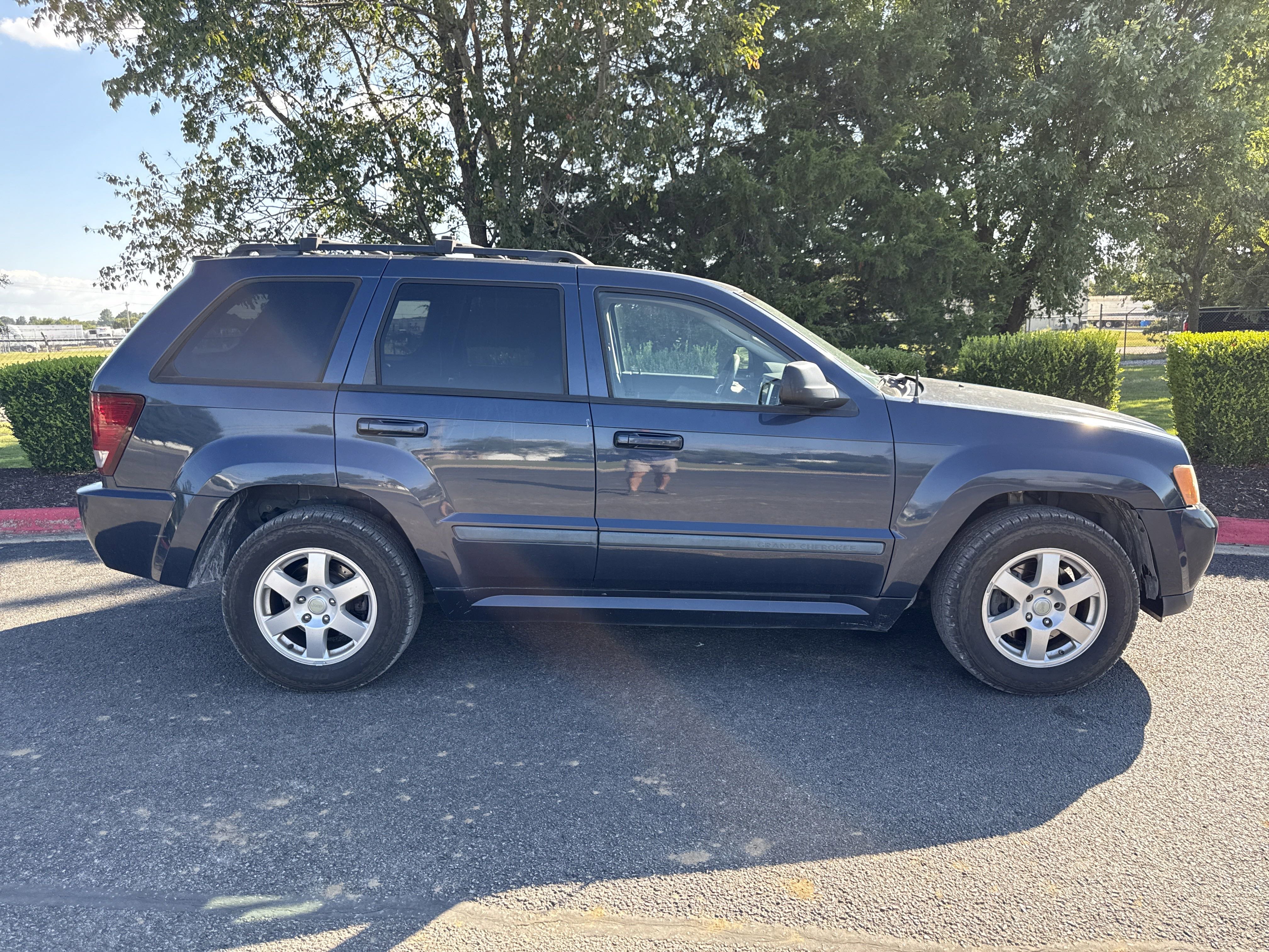 Used 2009 Jeep Grand Cherokee Laredo with VIN 1J8GR48KX9C540719 for sale in Bentonville, AR