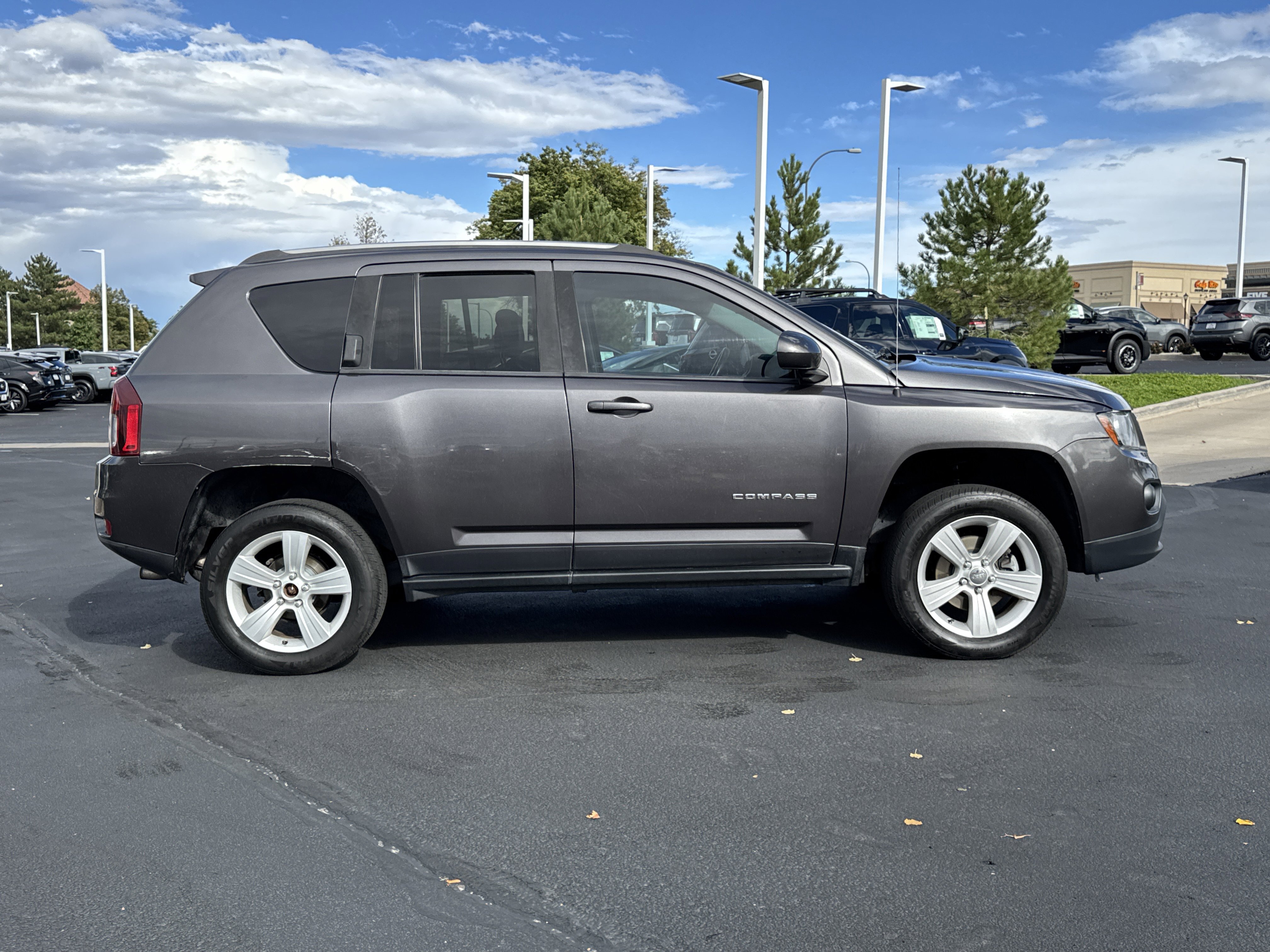 Used 2015 Jeep Compass Latitude with VIN 1C4NJDEB9FD168872 for sale in Lakewood, CO