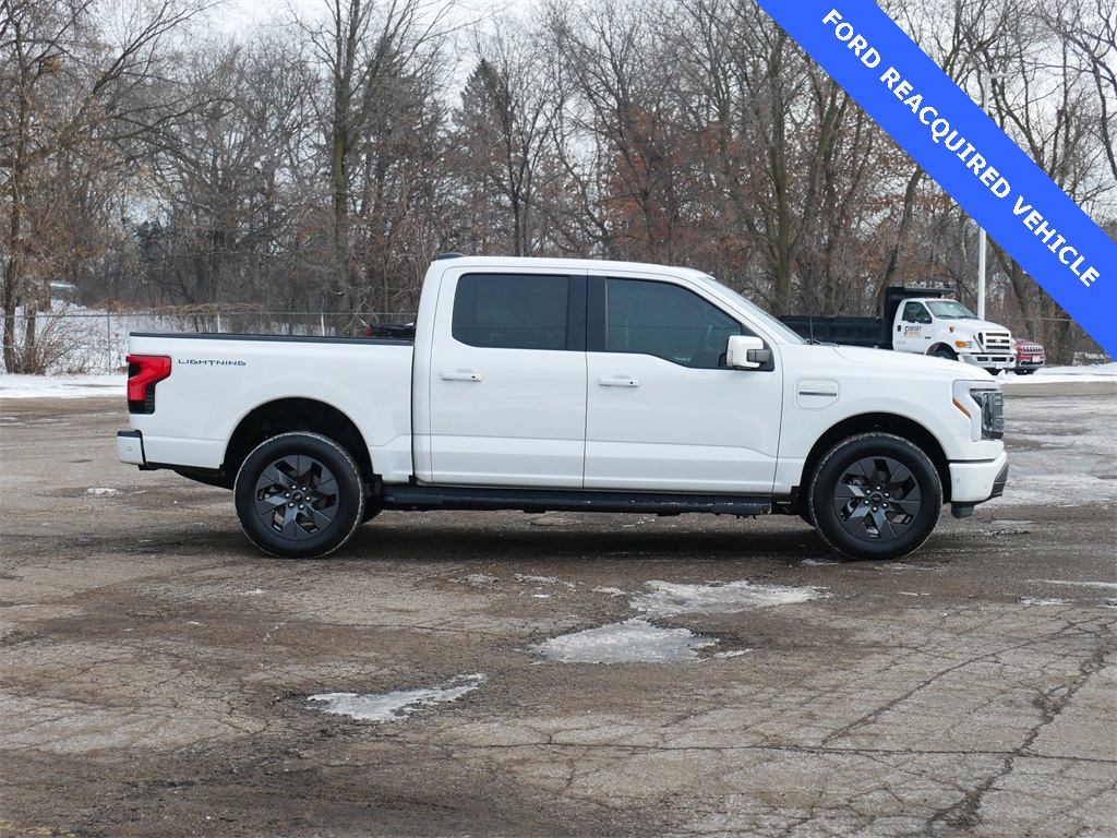Used 2023 Ford F-150 Lightning Lariat with VIN 1FT6W1EV5PWG05285 for sale in White Bear Lake, MN