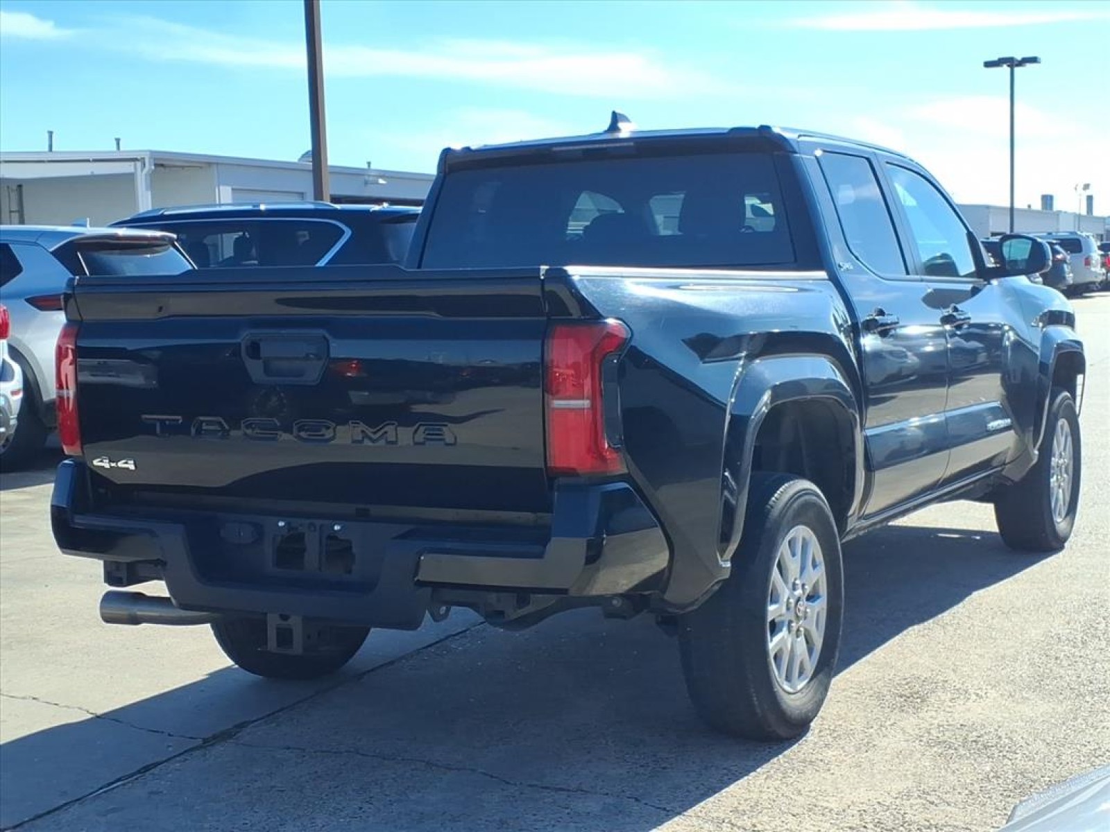 2024 Toyota Tacoma 4WD SR5 Black at Robbins Nissan