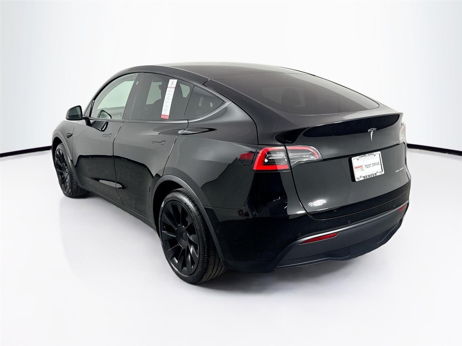 Used 2021 Tesla Model Y Long Range with VIN 5YJYGDEE3MF125558 for sale in Cumming, GA